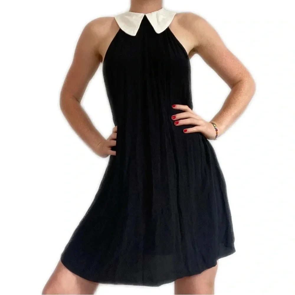 REFORMATION BLACK SLEEVELESS MINIDRESS 🎬